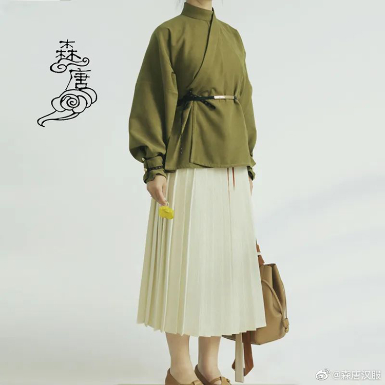 晋制曲领窄袖襦，袖口加了收口设计